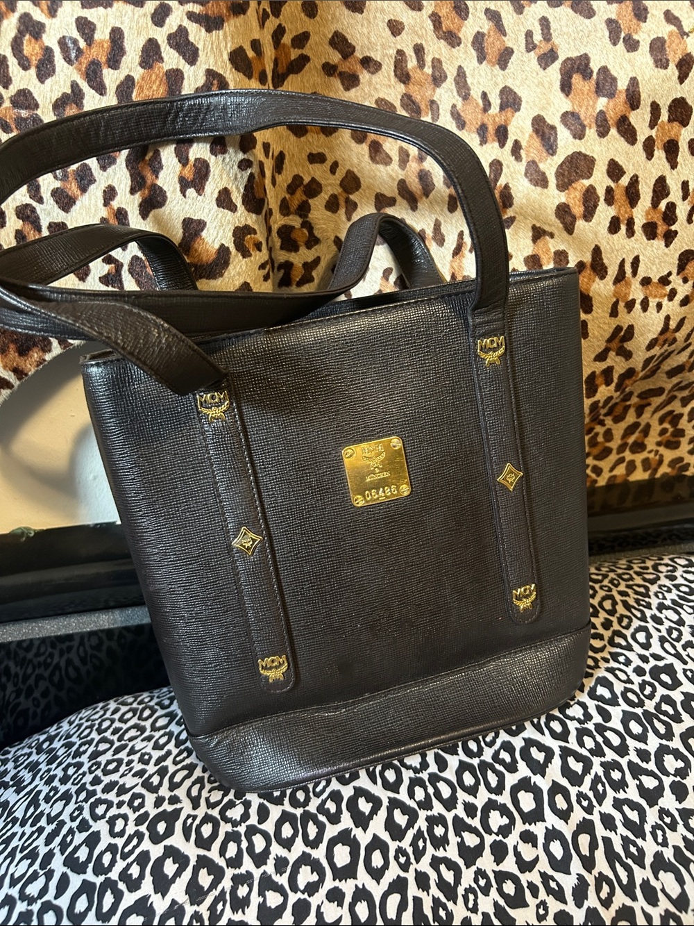 MCM vintage Black Leather Tote with Gold Logo Plaque